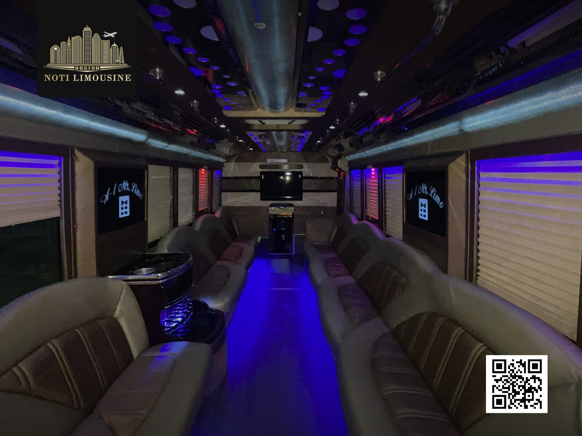 Front angle of a Ford F550 party bus featuring bold exterior design and tinted windows