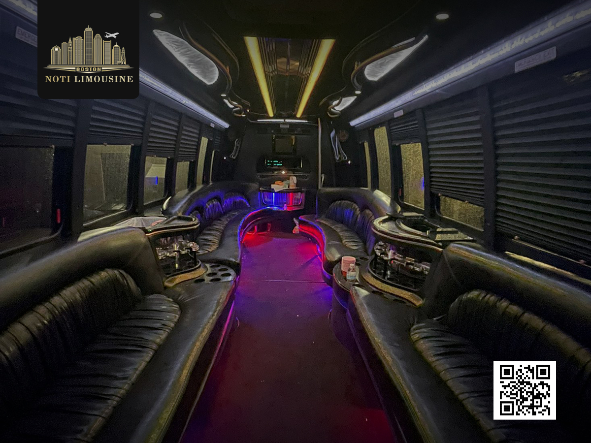Side view of a luxurious white Ford party bus designed for stylish group travel and celebrations.